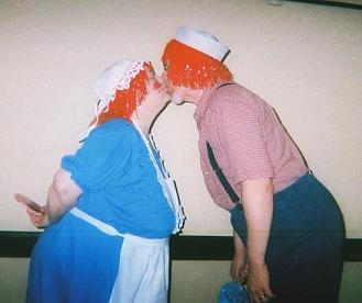 Image: Man and woman dressed as Raggedy Ann and Andy.